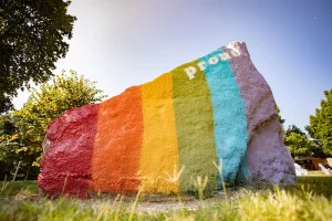 Pride colored Spirit Rock on campus